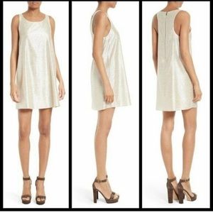 Alice and Olivia size S/P halter dress in off white with silver fabric